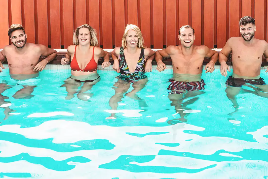 Friends chilling in a ReadyPool container pool